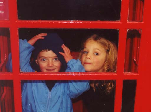 Joseph and Margaret in phone booth.